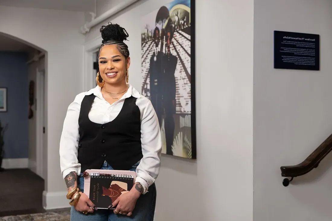 Darla Hobbs smiling inside the lender center.